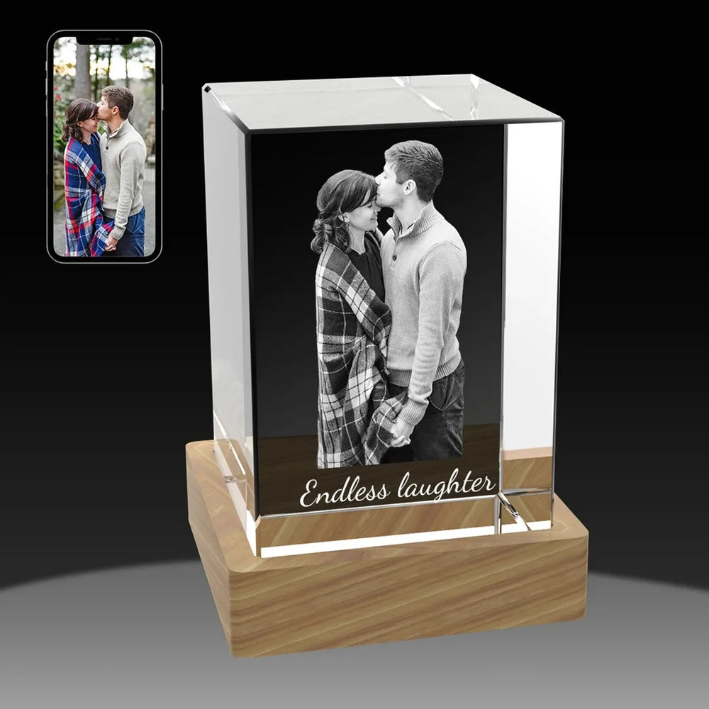 Personalised cube crystal with 3D photo displayed against black background – elegant and clear