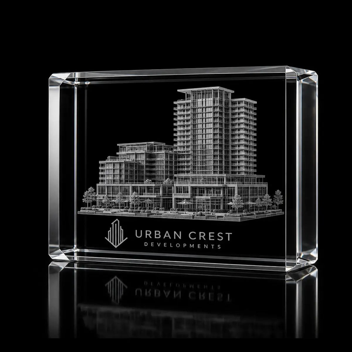 3D building model engraved inside a clear landscape crystal award, custom property development trophy with 360-degree display.