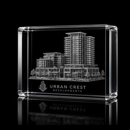 3D building model engraved inside a clear landscape crystal award, custom property development trophy with 360-degree display.
