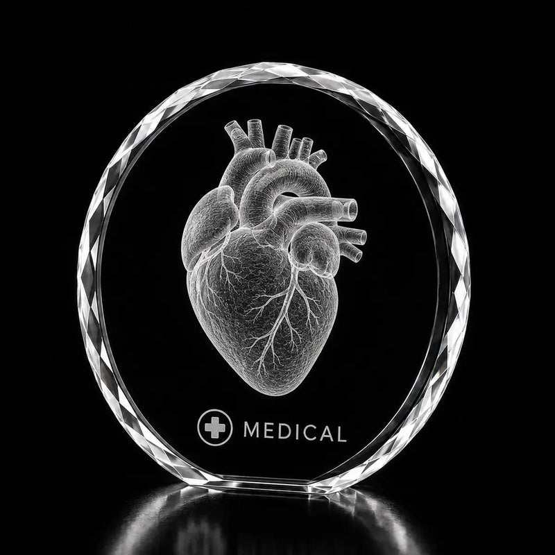 3D human heart laser engraved inside a clear round crystal award, custom medical crystal trophy with 360-degree display.