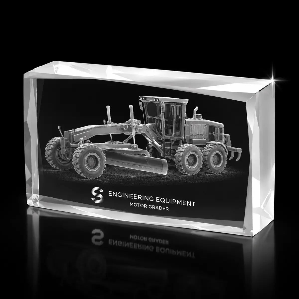 3D motor grader laser engraved inside a clear faceted landscape crystal award, custom engineering equipment trophy with 360-degree display.