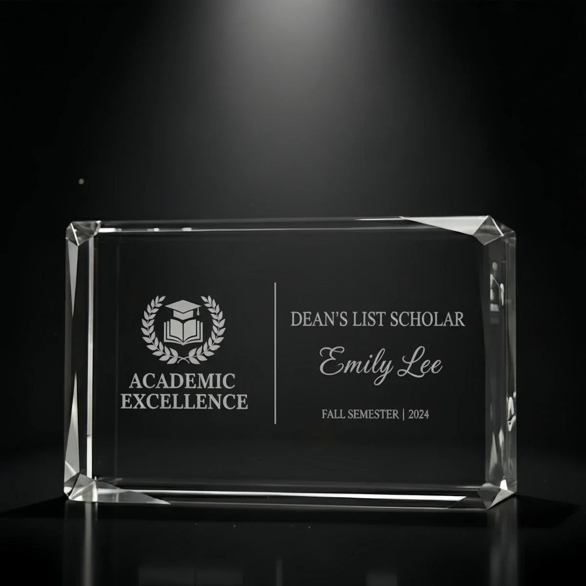 Personalised faceted landscape trophy for academic achievement.