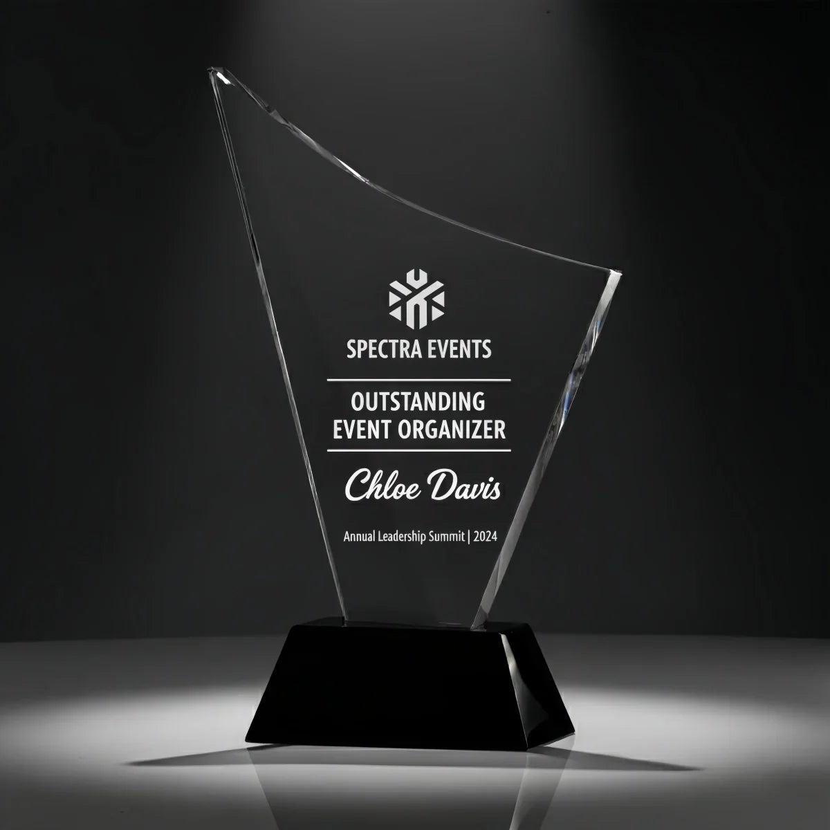 Custom curved crystal plaque for event appreciation and recognition