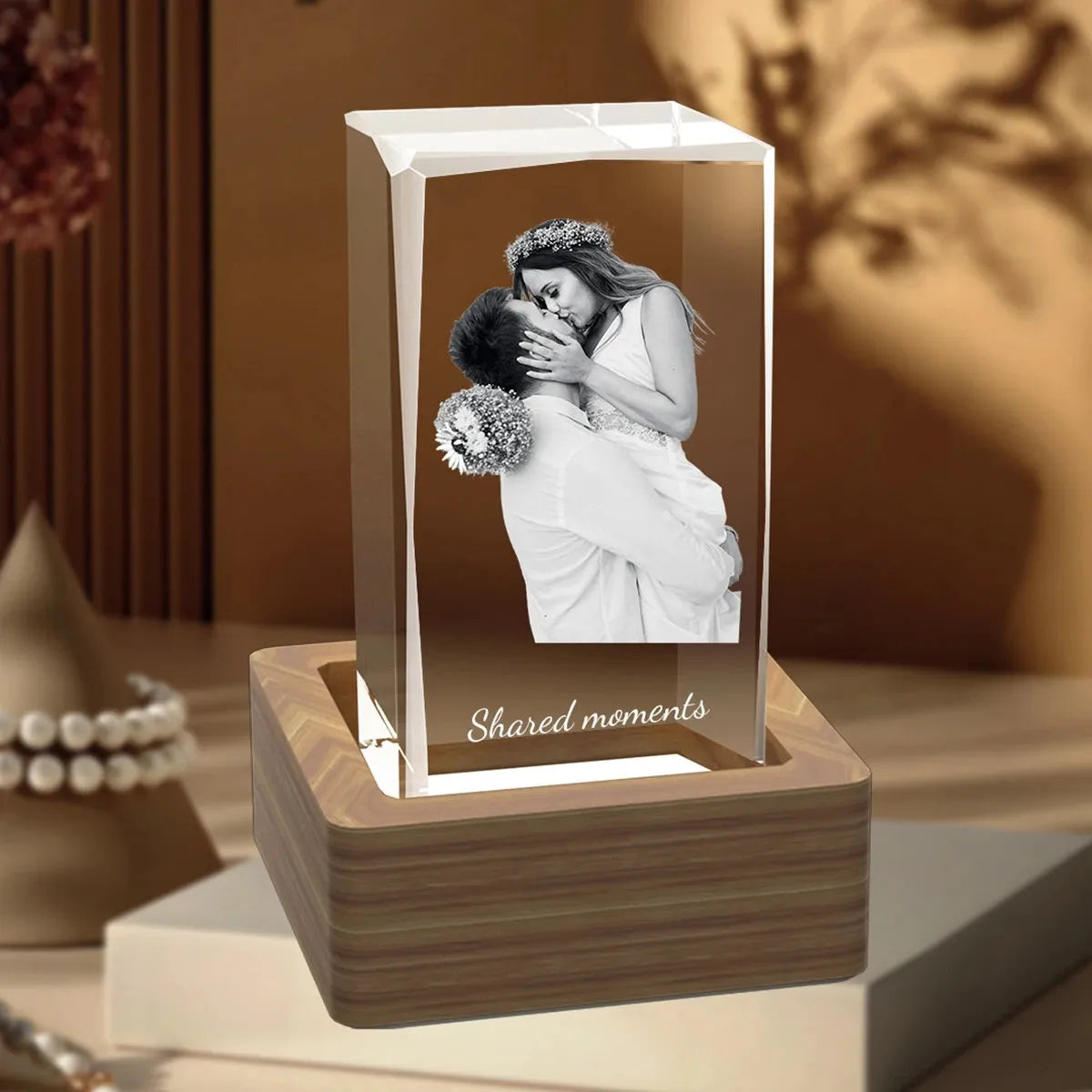 Large faceted crystal photo cube on wooden LED base – warm and elegant light display