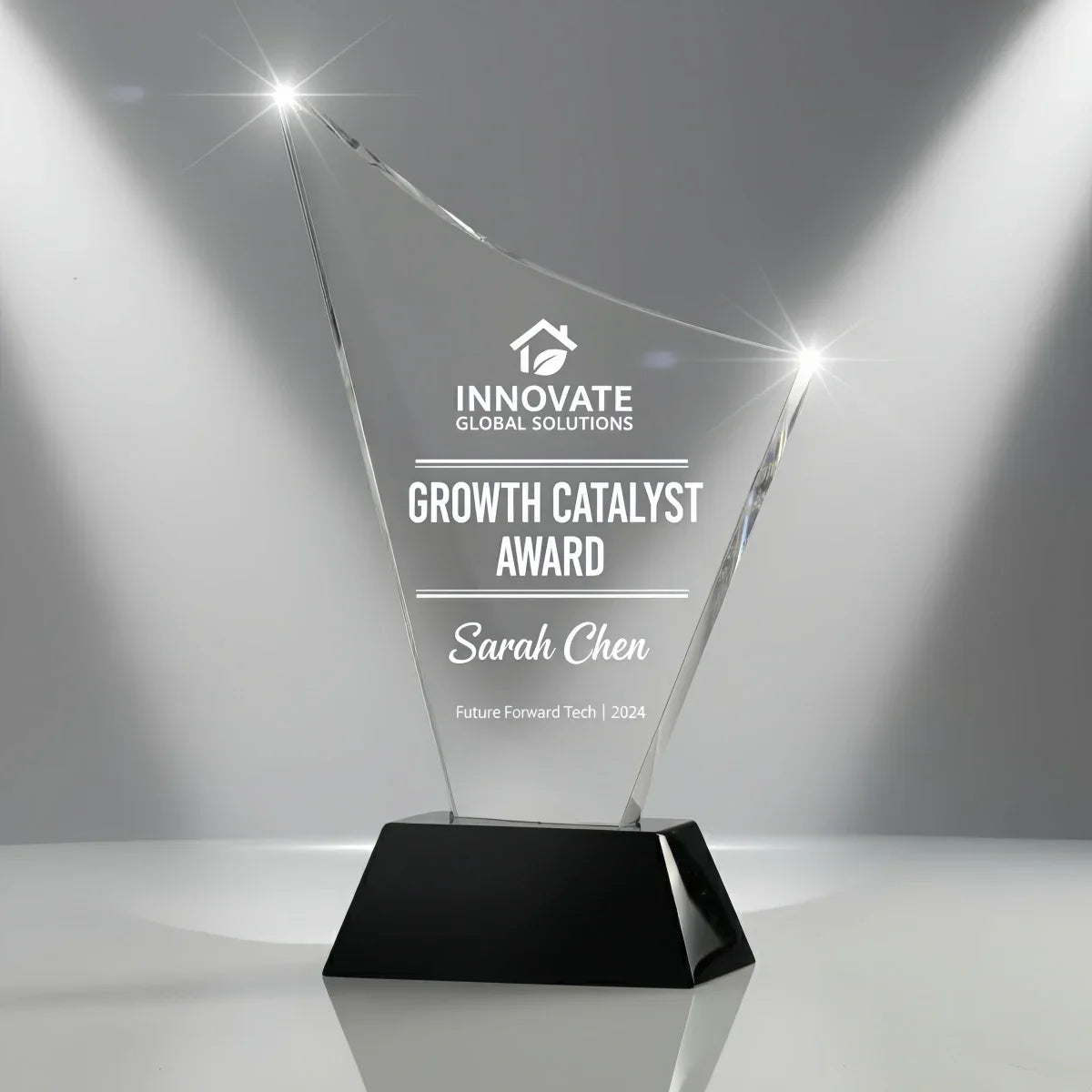 Engraved sail-shaped crystal promotional award for companies