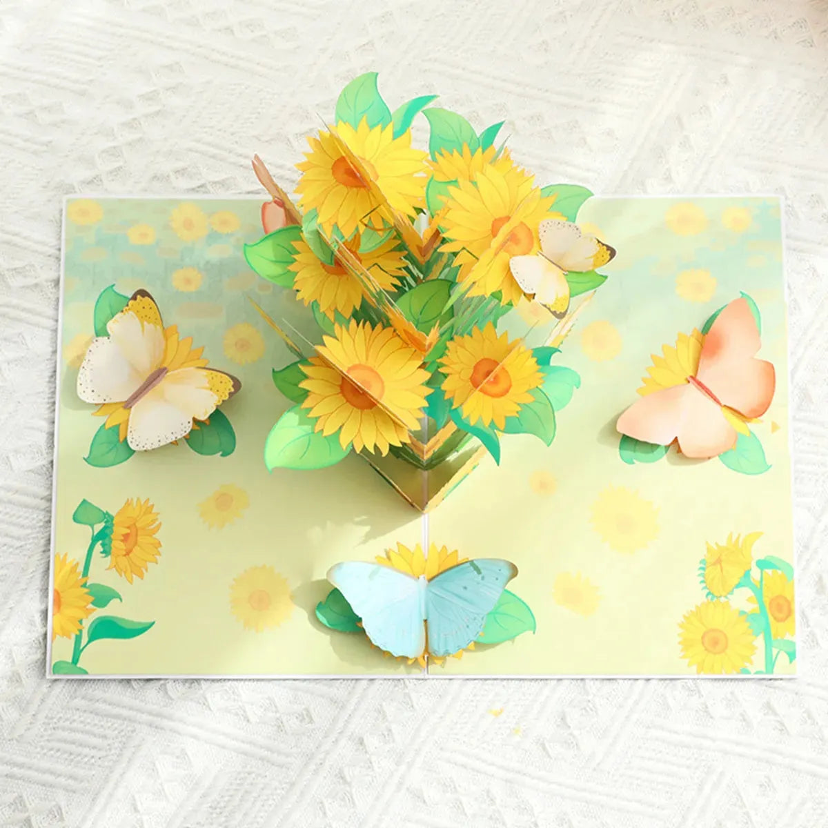 Sunflower pop-up greeting card shown in lifestyle setting. Buy online with free shipping in Australia.