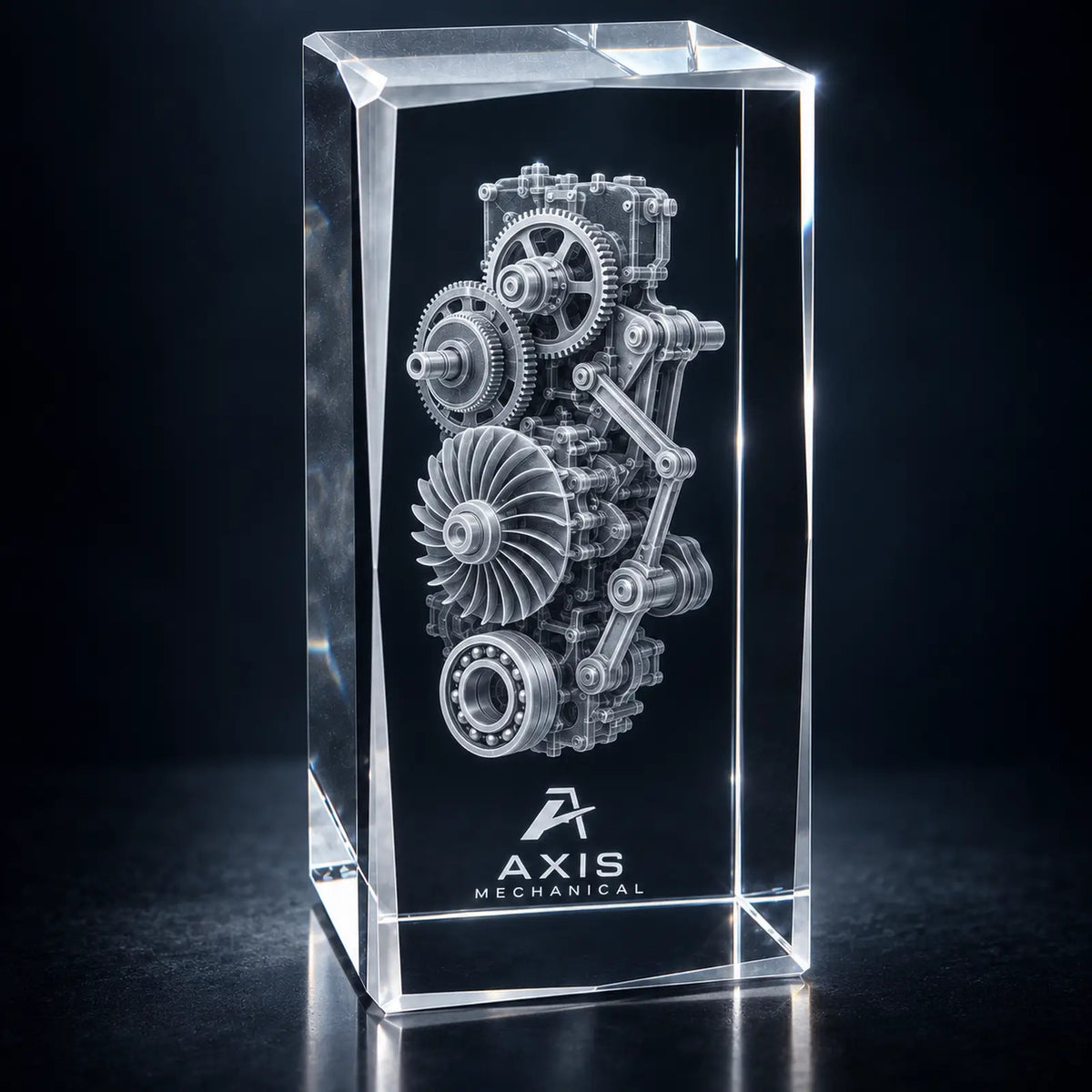 Faceted crystal award showing fine gears, turbine blades and bearings in a 3D mechanical engraving.