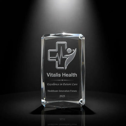 Custom 3D crystal award trophy faceted cube with personalised engraving, featuring medical cross and heartbeat design for patient care excellence, healthcare innovation and staff recognition.