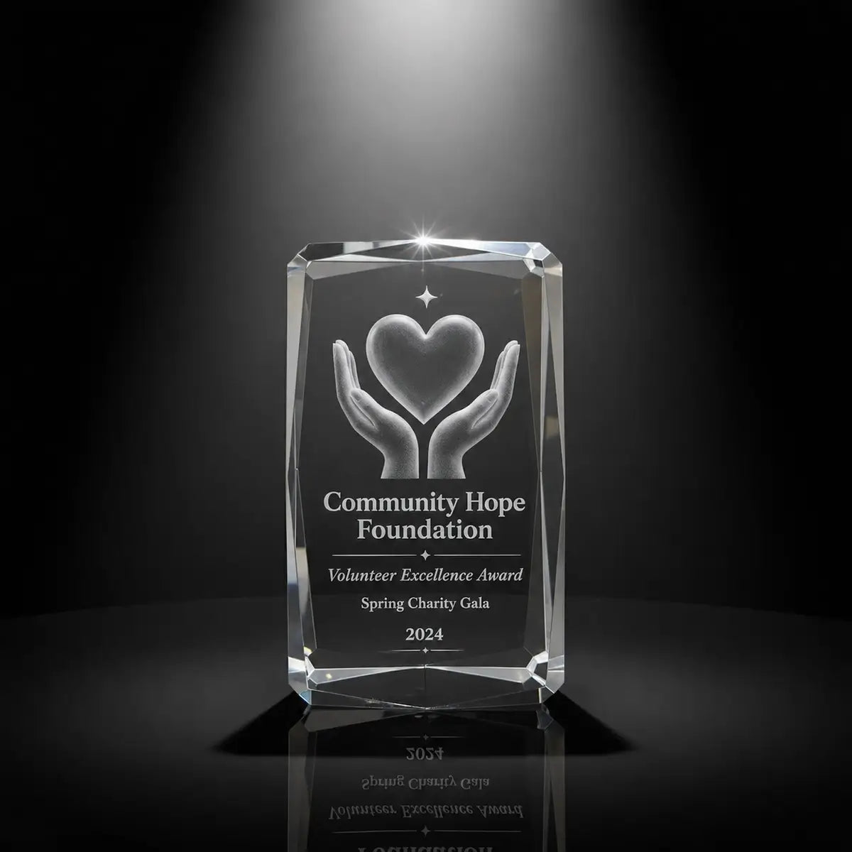 Custom 3D crystal award trophy faceted cube with personalised engraving, featuring hands and heart design for volunteer excellence, charity recognition and community appreciation awards.