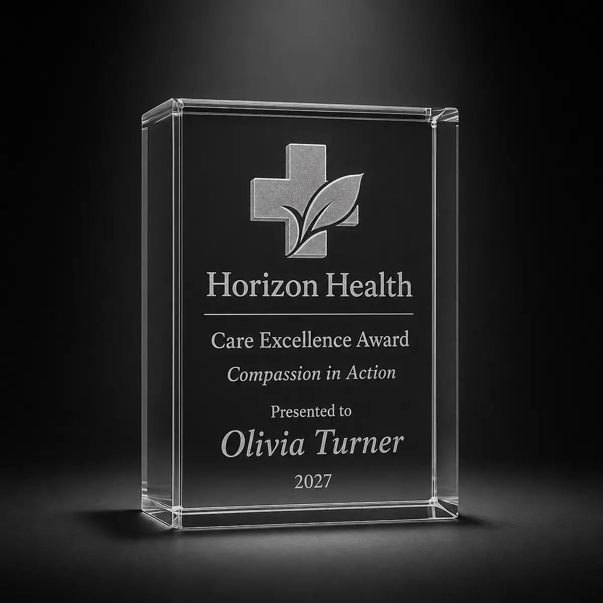 Custom 3D crystal award trophy portrait with personalised engraving, featuring healthcare logo design for care excellence, medical staff appreciation and patient care recognition.