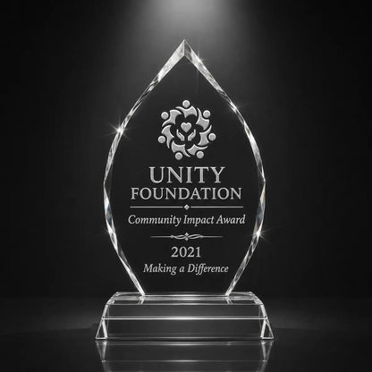 Custom arrowhead crystal community impact award trophy with personalised engraving, faceted glass plaque for nonprofit, charity and volunteer recognition.