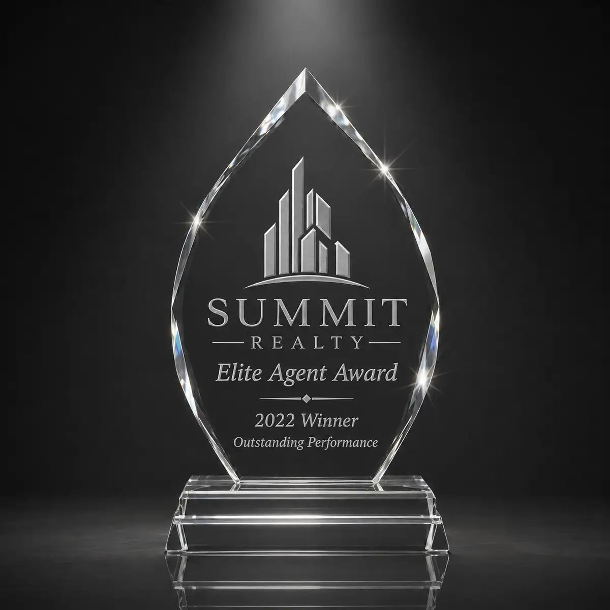 Custom arrowhead crystal real estate agent award with personalised engraving, faceted glass trophy for property sales achievement and elite agent recognition.
