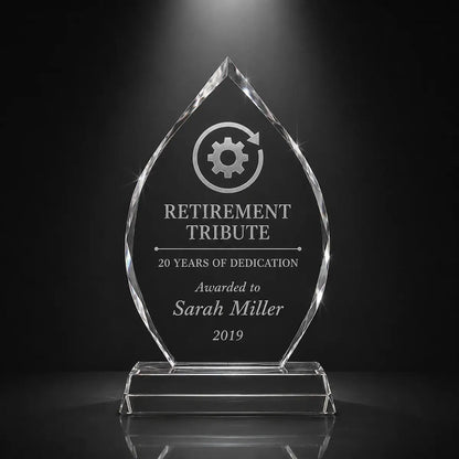 Custom arrowhead crystal retirement tribute award with personalised engraving, clear faceted trophy for employee appreciation, long service and dedication recognition.