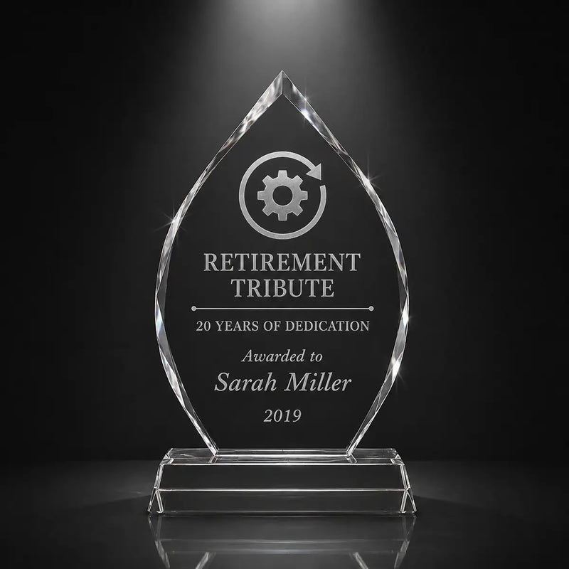 Custom arrowhead crystal retirement tribute award with personalised engraving, clear faceted trophy for employee appreciation, long service and dedication recognition.