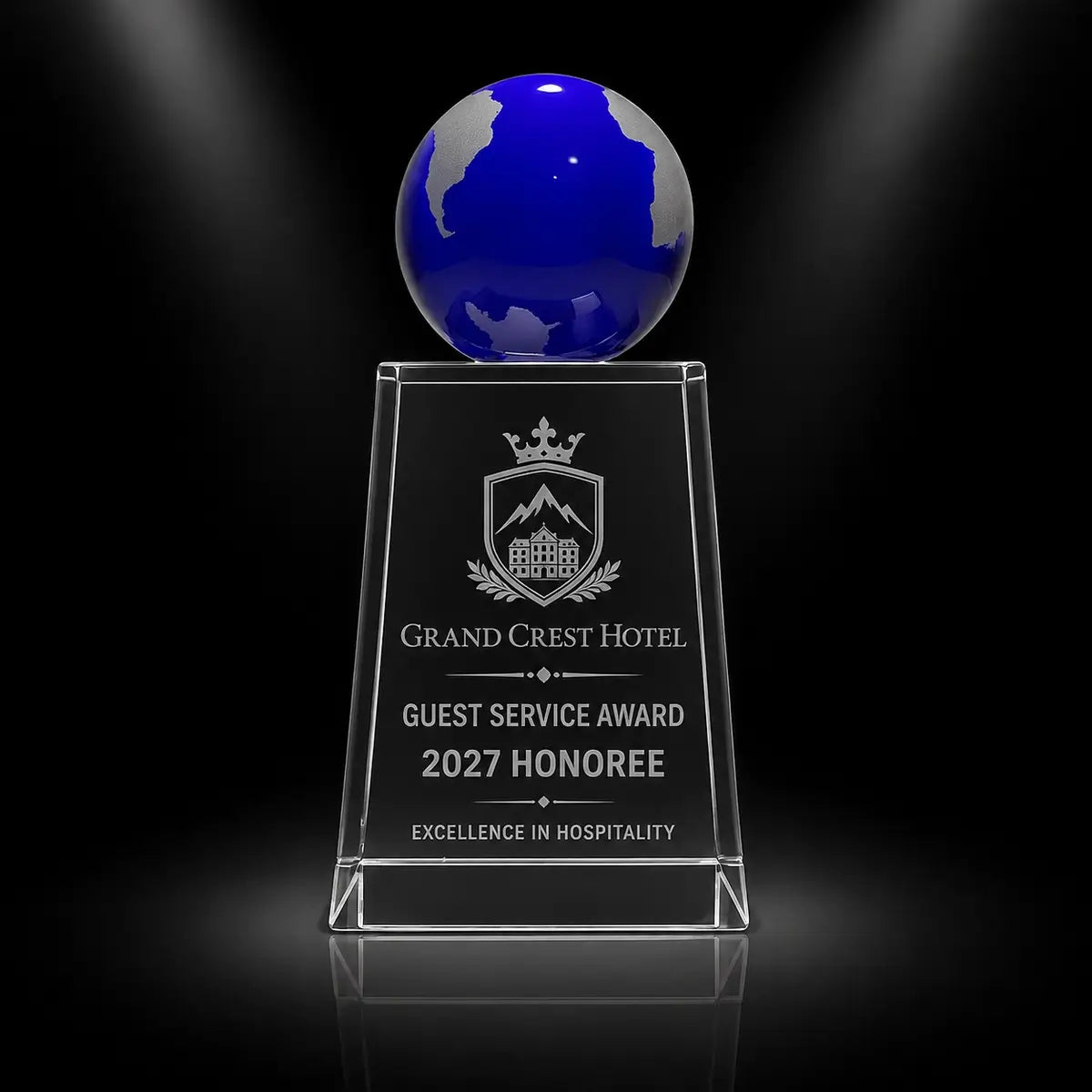 Custom blue globe crystal award trophy with personalised engraving for guest service excellence, featuring a clear crystal column and blue globe top for hospitality and hotel staff recognition.