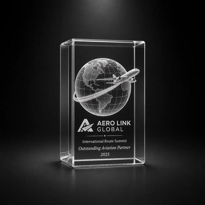 Custom crystal award trophy cube with personalised engraving, featuring a globe and airplane design for aviation partners, international route summits and travel industry recognition.