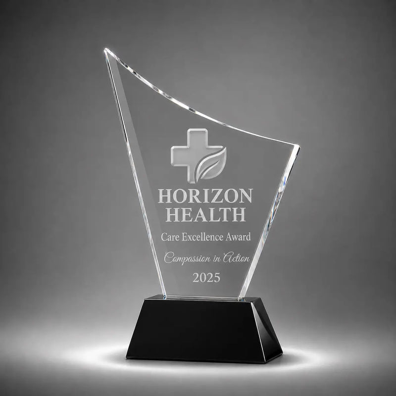 Custom curved crystal care excellence award trophy with personalised engraving, clear glass plaque and black base for healthcare recognition, nursing awards and medical staff appreciation.