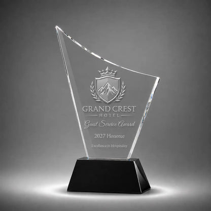Custom curved crystal guest service award trophy with personalised engraving, clear glass plaque and black base for hospitality recognition, hotel awards and service excellence.