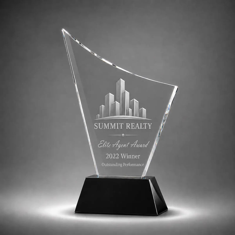 Custom curved crystal real estate agent award trophy with personalised engraving, clear glass plaque and black base for property sales achievement and elite agent recognition.