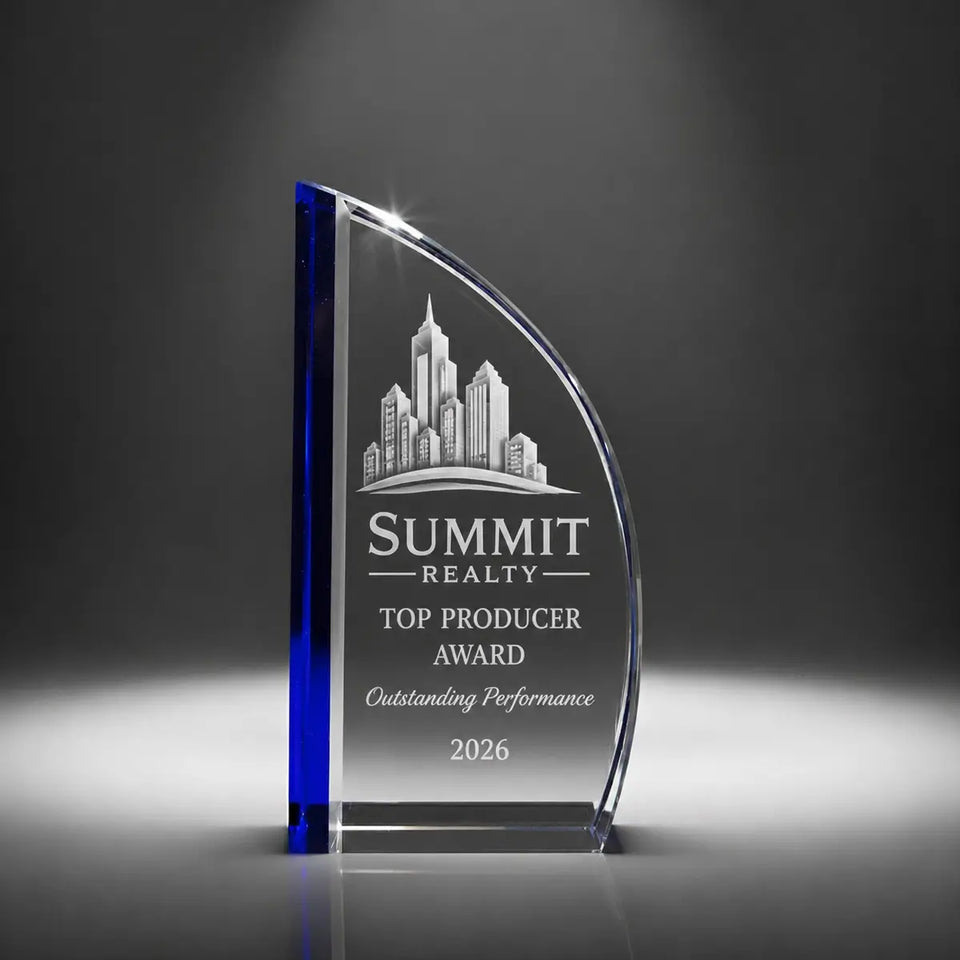 Custom sail crystal real estate top producer award with personalised engraving, clear glass plaque with blue accent for property sales achievement and agent recognition.
