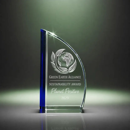 Custom sail crystal sustainability award trophy with personalised engraving, clear glass plaque with blue accent for environmental, green business and eco achievement recognition.