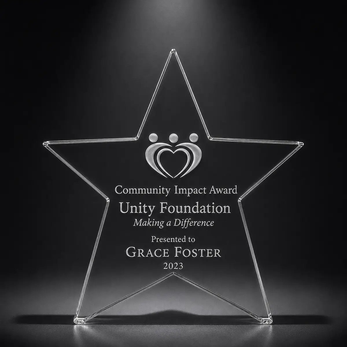 Custom star crystal community impact award trophy with engraved heart and people design, personalised for charity, volunteer and nonprofit recognition.